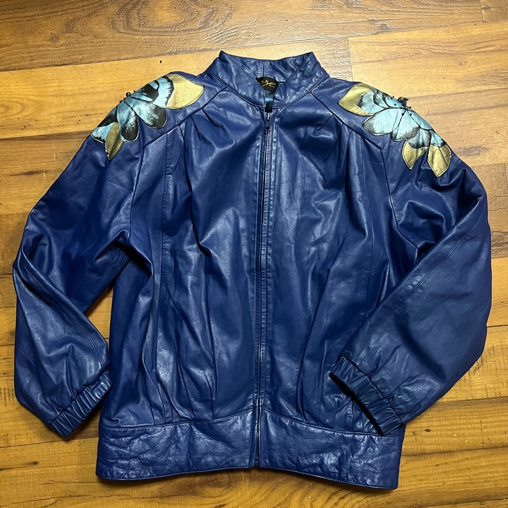 Blue leather vintage jacket women’s size small with beaded details on shoulder